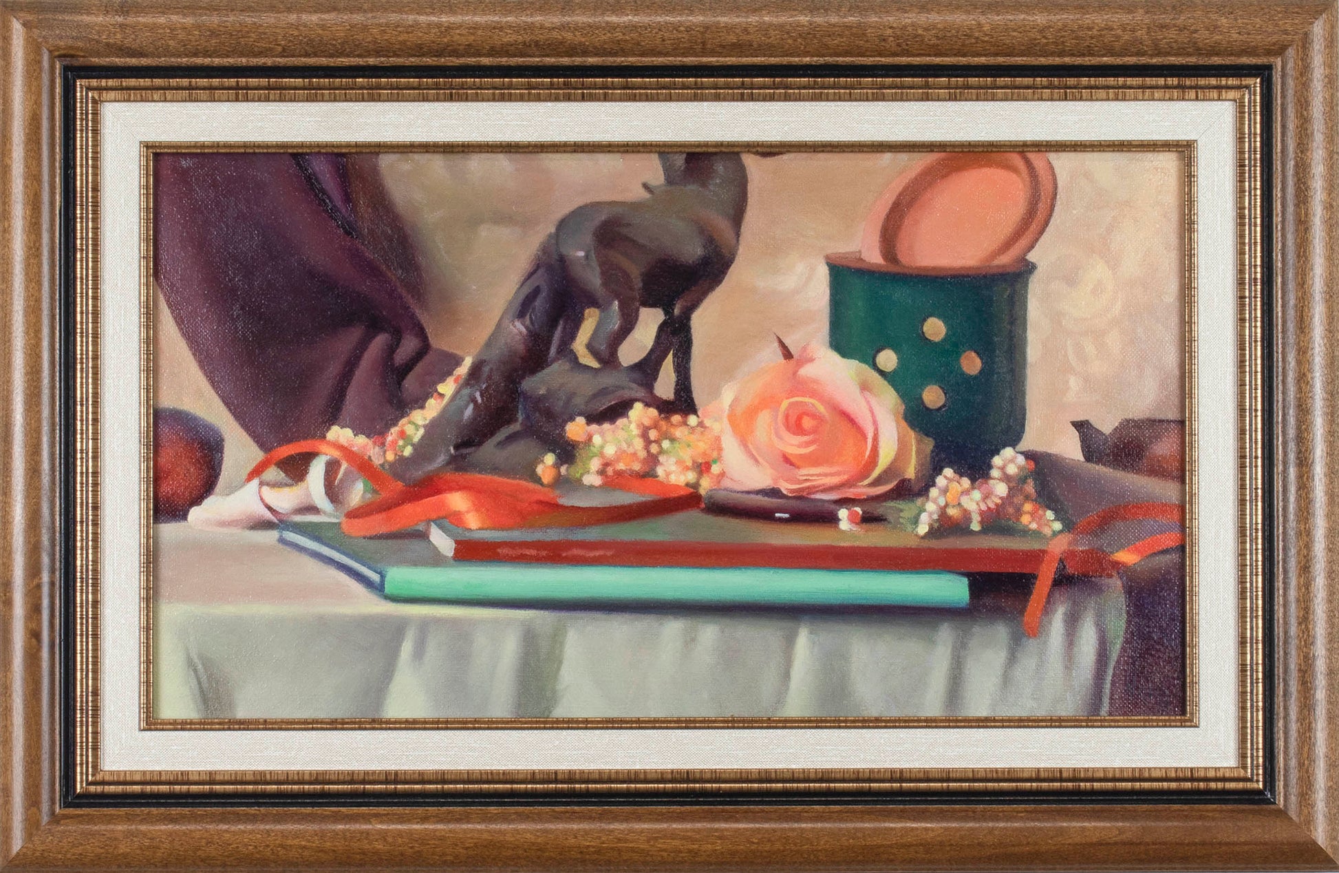 Framed still life painting with a table setting, including a rose, books, and decorative items.